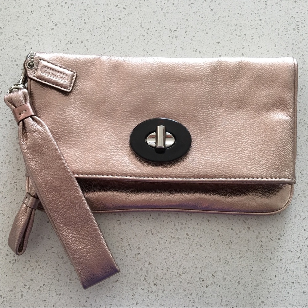 Authentic Coach metallic rose gold wristlet